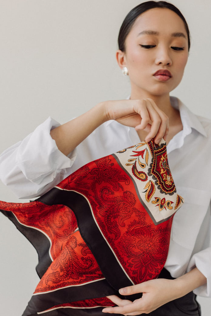 Woman Holding Red Scarf